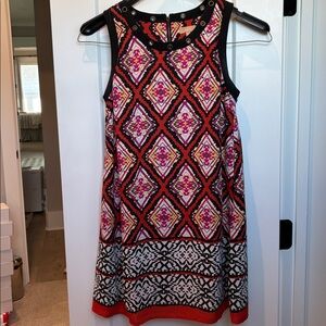 Takara sheath dress with geometric boho pattern and grommet detail